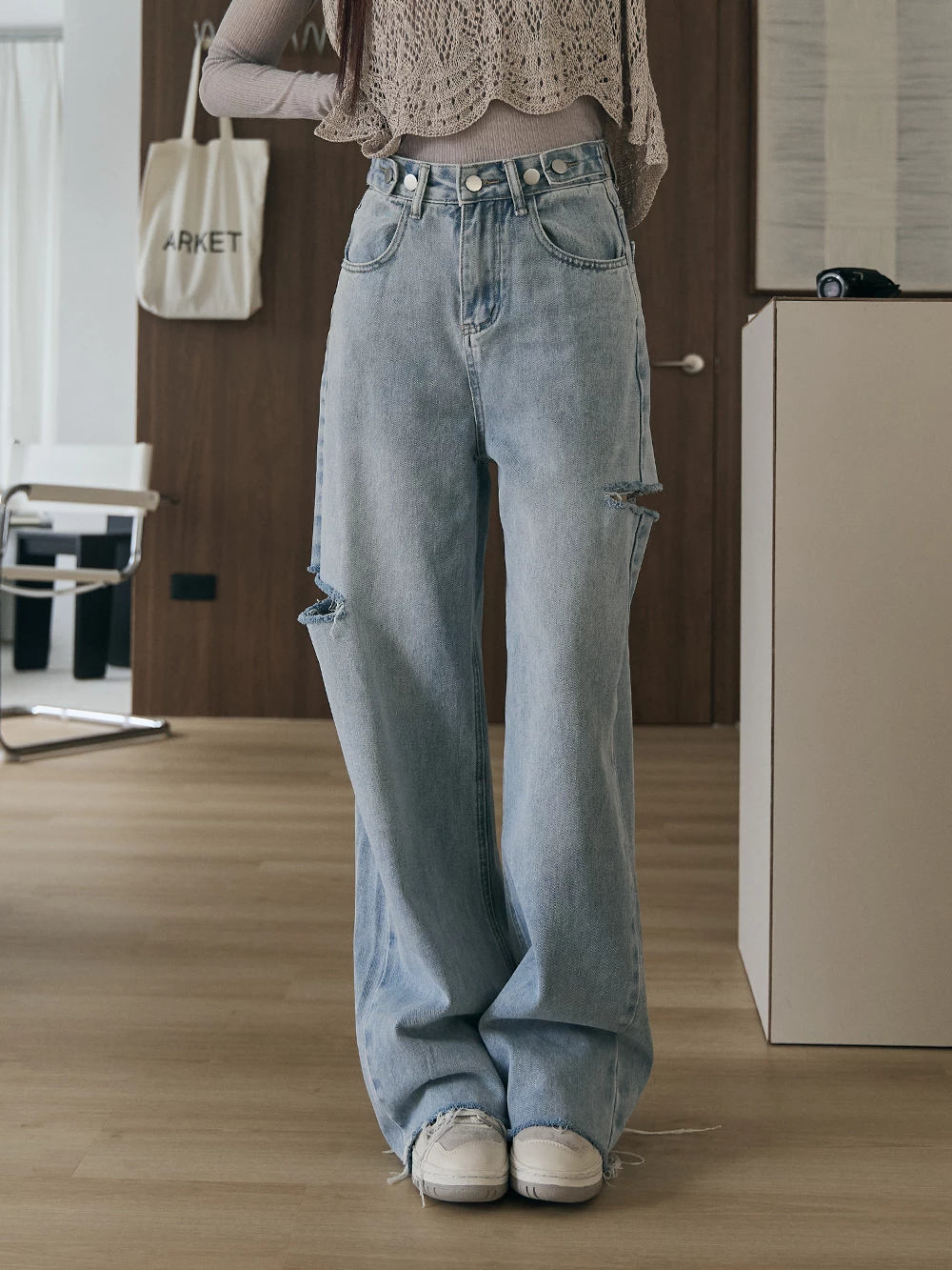 調節釦割破牛仔褲