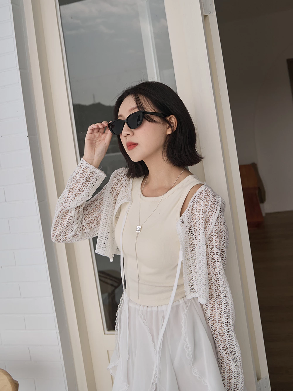 編織簍空透膚罩衫