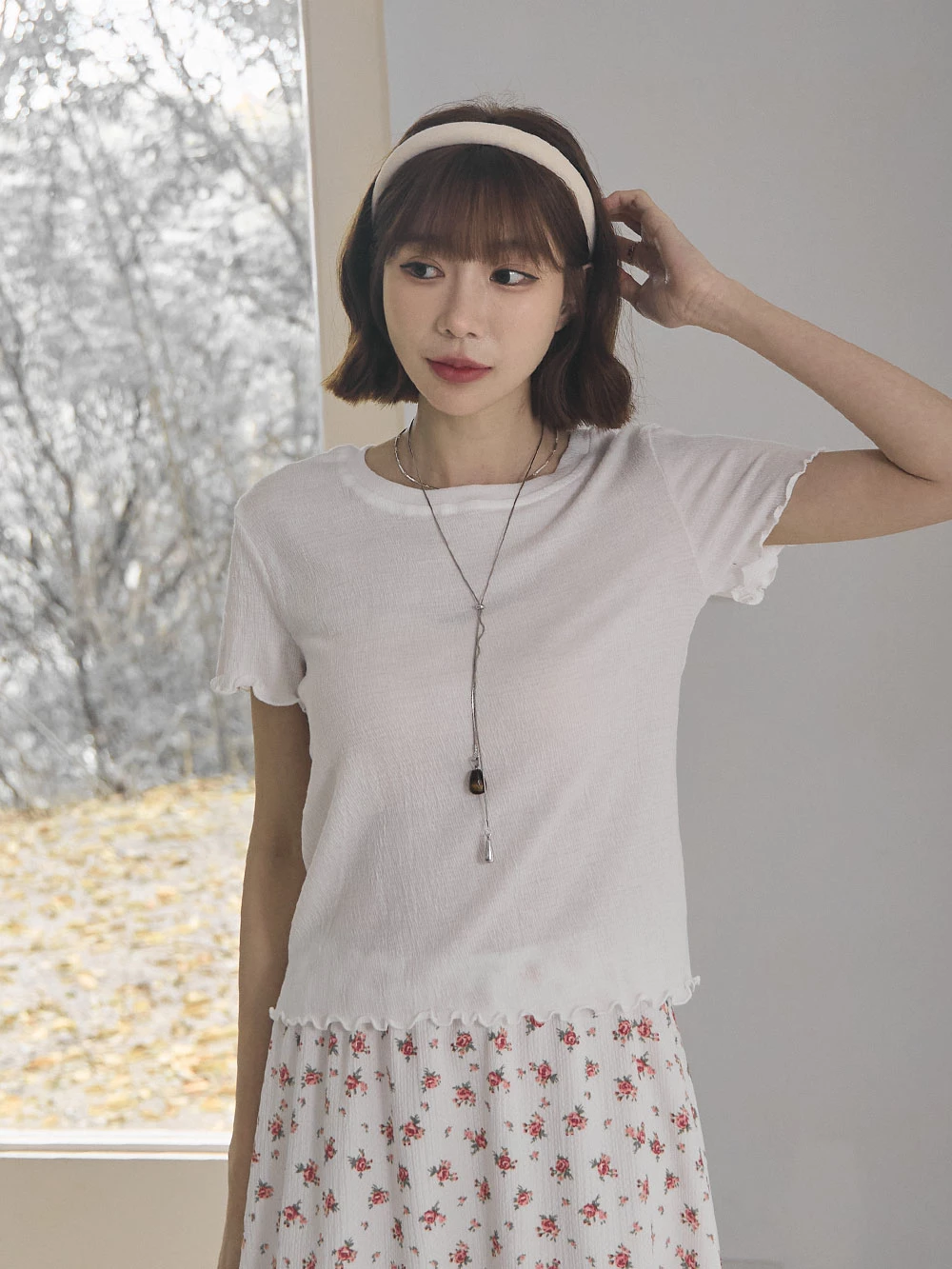 捲邊坑條圓領上衣